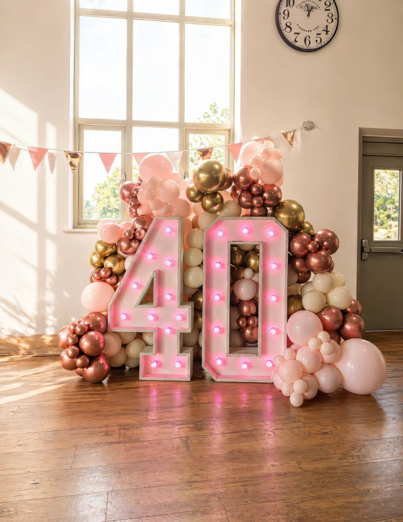 Rose gold 40th birthday light-up marquee with blush and chrome balloon installation in Surrey by River Fox Events