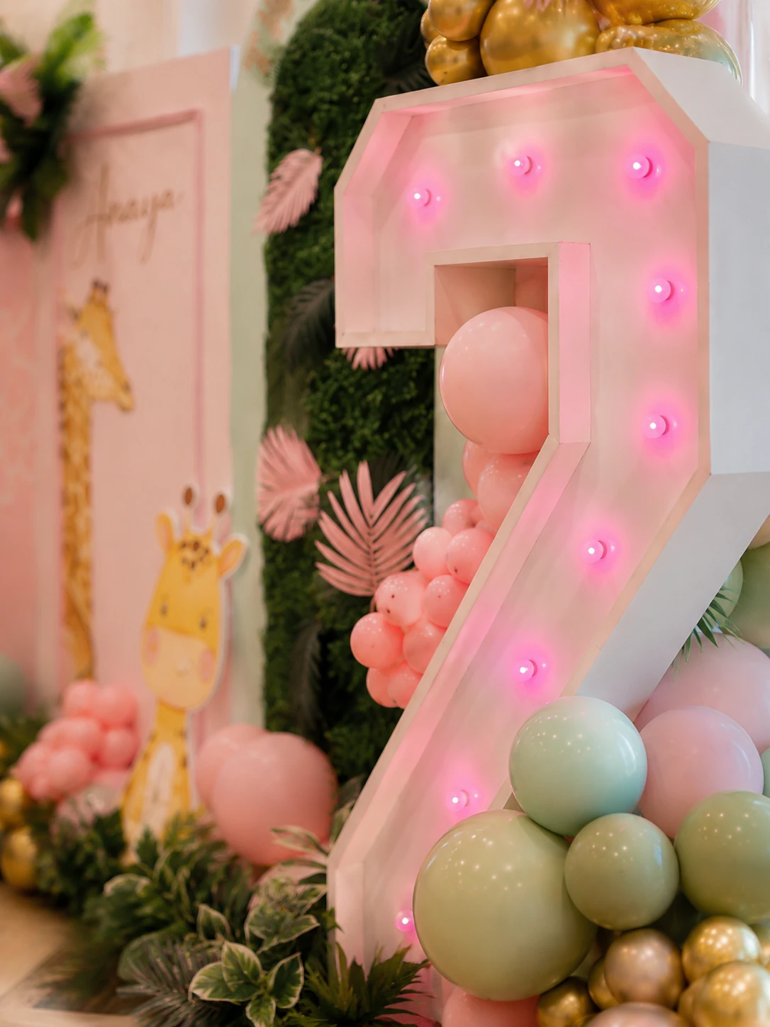 Close-up of the pink light-up two marquee from Anaya's pastel safari Two Wild birthday in Surrey by River Fox Events